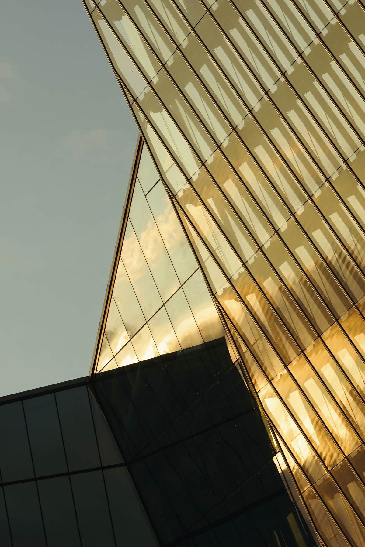 modern-glass-skyscraper-reflecting-sunlight-during-2026-03-25-22-41-52-utc